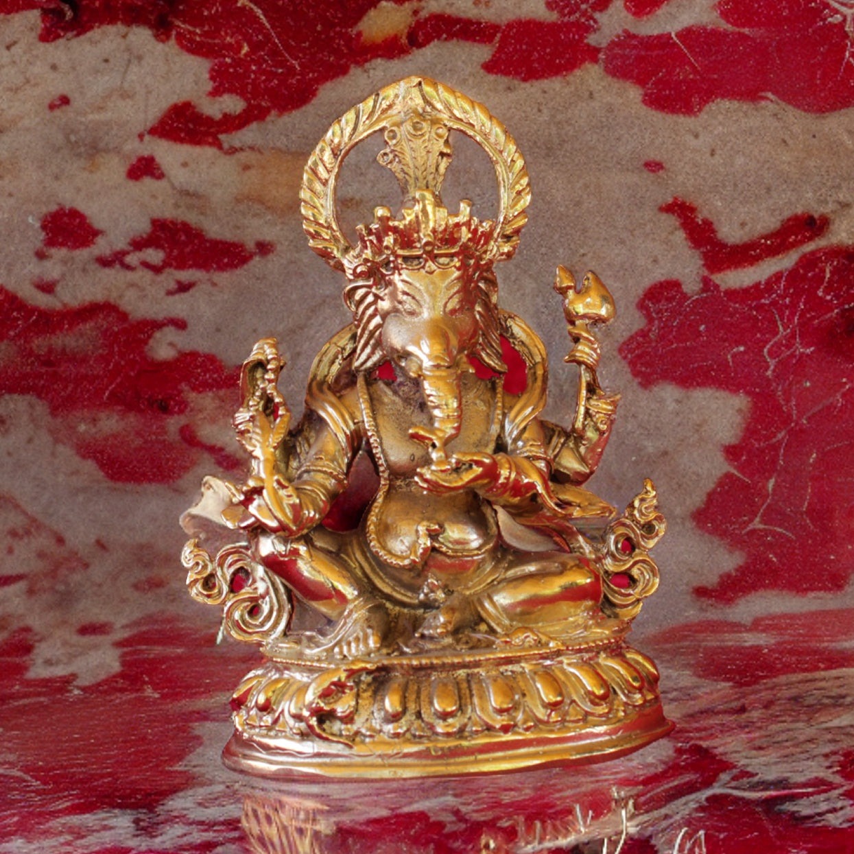 ganesh in red marble background